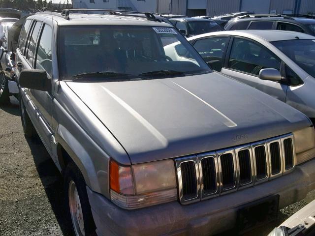 1J4GZ58SXVC747175 - 1997 JEEP GRAND CHER GRAY photo 1