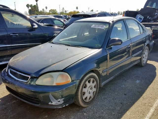 JHMEJ6627WS010521 - 1998 HONDA CIVIC DX GREEN photo 2