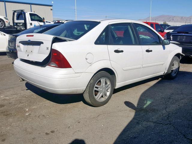 1FAFP34Z73W291703 - 2003 FORD FOCUS SE C WHITE photo 4