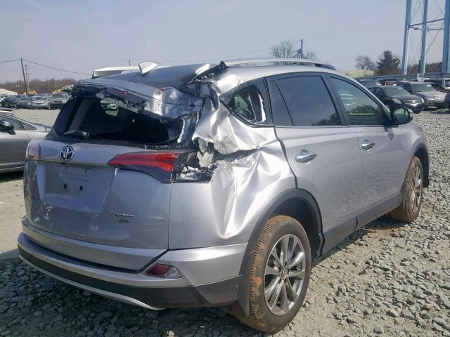 JTMDFREV7JD238611 - 2018 TOYOTA RAV4 LIMIT SILVER photo 4