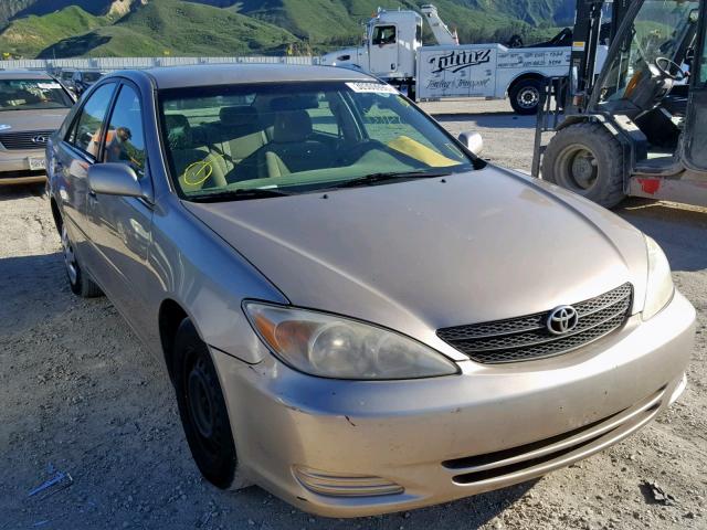 JTDBE32K120128955 - 2002 TOYOTA CAMRY LE GOLD photo 1