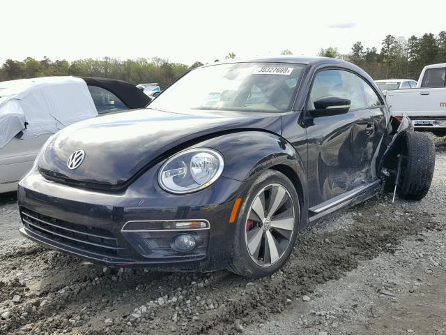 3VWVT7AT0DM677550 - 2013 VOLKSWAGEN BEETLE TUR BLACK photo 2