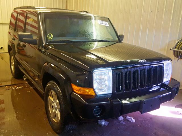 1J8HG48N76C171219 - 2006 JEEP COMMANDER BLACK photo 1