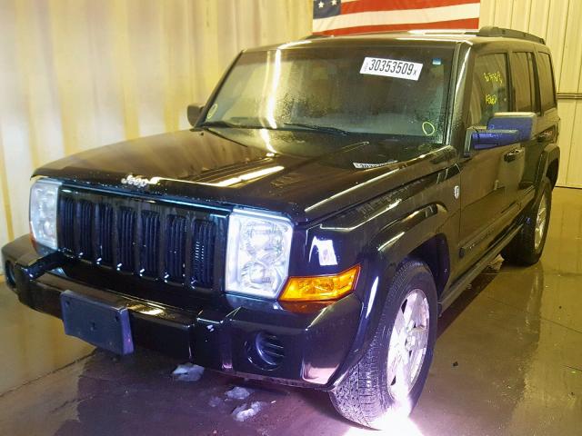 1J8HG48N76C171219 - 2006 JEEP COMMANDER BLACK photo 2