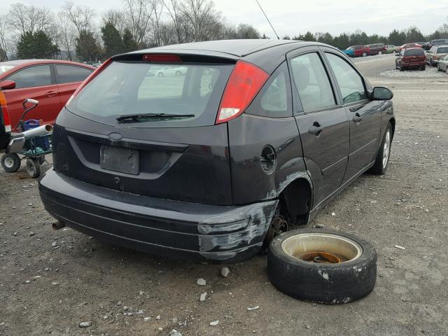 1FAFP37N77W272437 - 2007 FORD FOCUS ZX5 BLACK photo 4