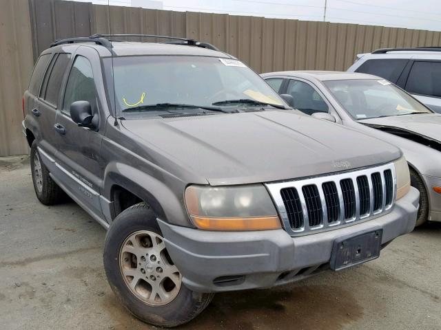 1J4G258S3XC704000 - 1999 JEEP GRAND CHER GRAY photo 1