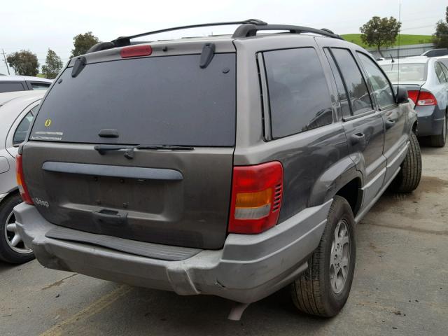 1J4G258S3XC704000 - 1999 JEEP GRAND CHER GRAY photo 4