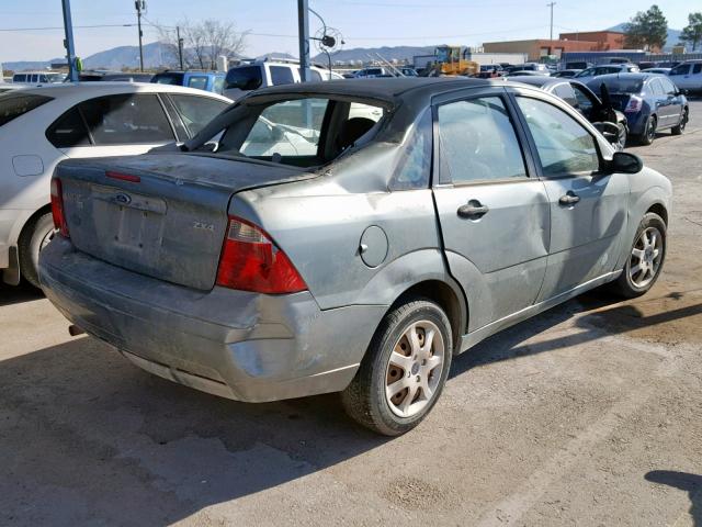 1FAFP34N35W245382 - 2005 FORD FOCUS ZX4 GREEN photo 4