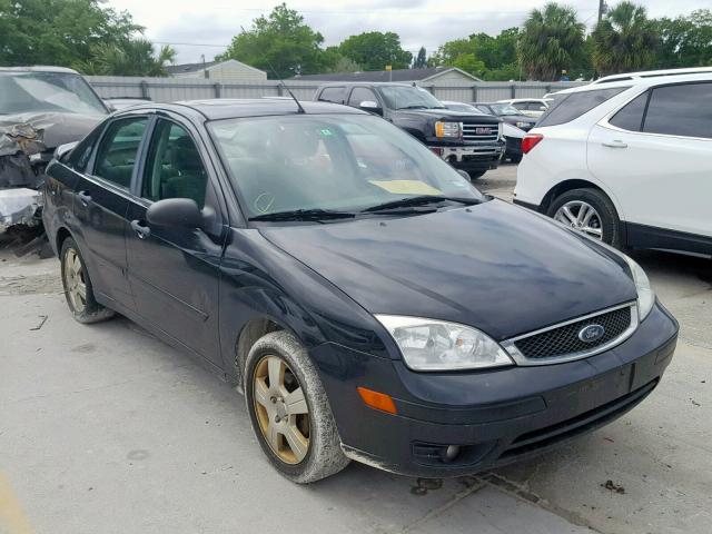 1FAHP34N27W325770 - 2007 FORD FOCUS ZX4 BLACK photo 1