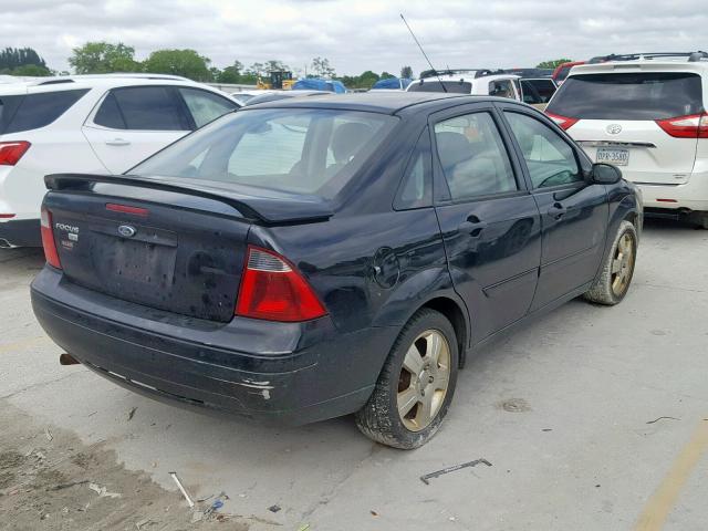 1FAHP34N27W325770 - 2007 FORD FOCUS ZX4 BLACK photo 4