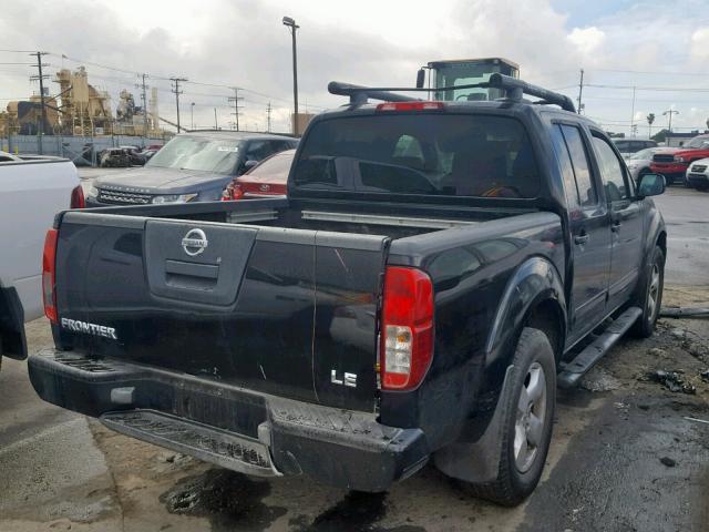 1N6AD07U66C461631 - 2006 NISSAN FRONTIER C BLACK photo 4