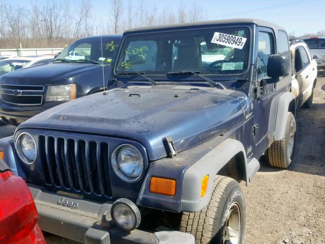 1J4FA49S14P742594 - 2004 JEEP WRANGLER / BLUE photo 2