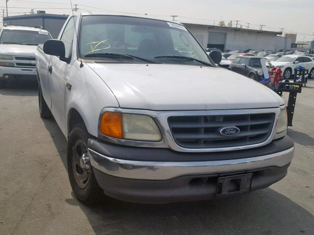 2FTRF17224CA41280 - 2004 FORD F-150 HERI WHITE photo 1