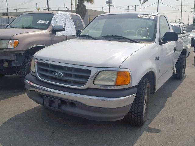 2FTRF17224CA41280 - 2004 FORD F-150 HERI WHITE photo 2