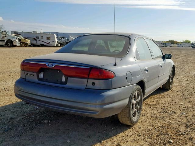 1FAFP6634XK217890 - 1999 FORD CONTOUR SE BLUE photo 4