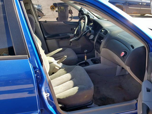 JM1BJ225531209775 - 2003 MAZDA PROTEGE DX BLUE photo 5