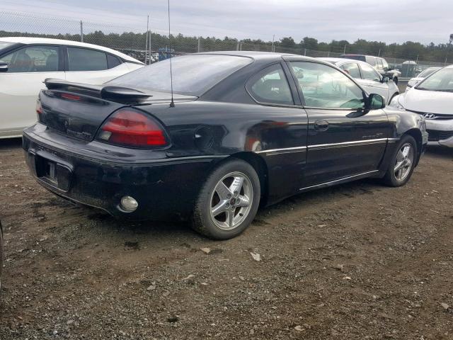 1G2NW12E61M563264 - 2001 PONTIAC GRAND AM G BLACK photo 4