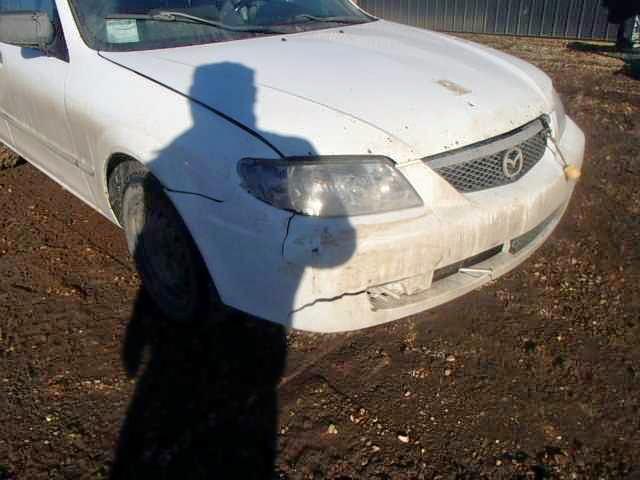 JM1BJ222521581928 - 2002 MAZDA PROTEGE SE WHITE photo 9