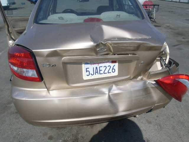 KNADC125446339111 - 2004 KIA RIO GOLD photo 10