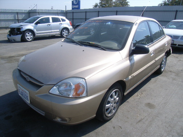 KNADC125446339111 - 2004 KIA RIO GOLD photo 2