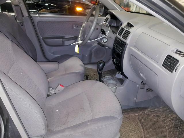 KNADC125536223673 - 2003 KIA RIO GRAY photo 5