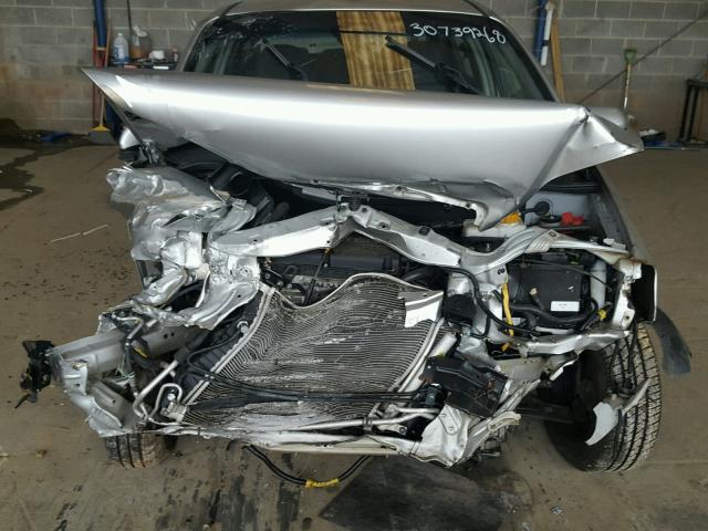 KL1TD5DE3BB190542 - 2011 CHEVROLET AVEO LS SILVER photo 9