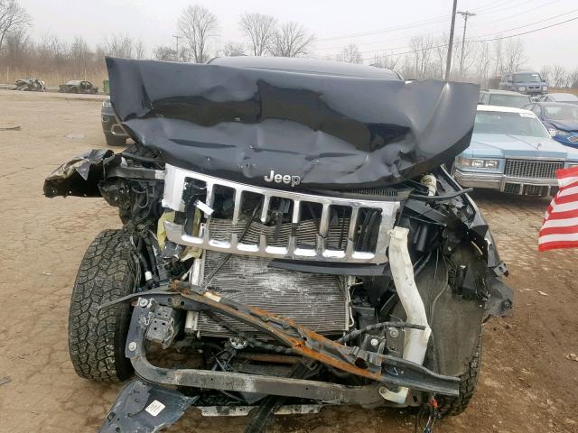 1J4RR4GG0BC679318 - 2011 JEEP GRAND CHER BLACK photo 7