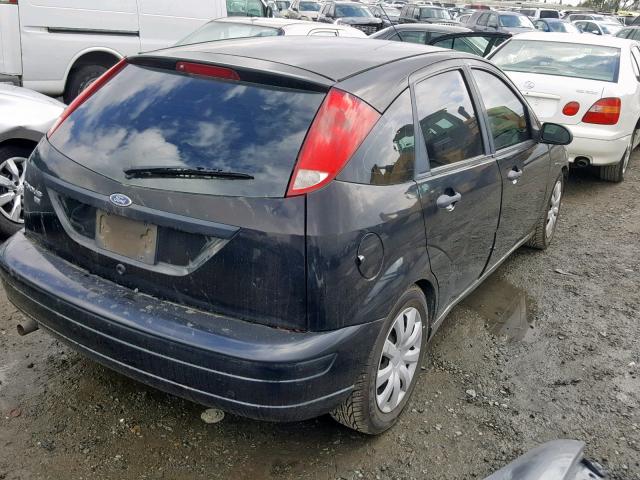 1FAHP37N07W344555 - 2007 FORD FOCUS ZX5 BLACK photo 4