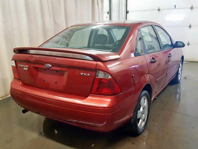 1FAFP34NX5W205462 - 2005 FORD FOCUS ZX4 MAROON photo 4