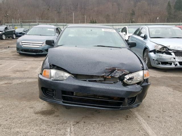 JA3AY11A32U041534 - 2002 MITSUBISHI MIRAGE DE BLACK photo 7