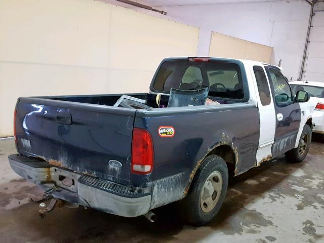 2FTZX1764WCB18699 - 1998 FORD F150 BLUE photo 4