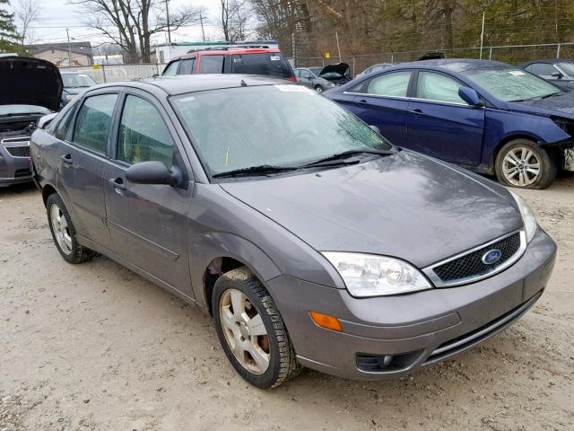 1FAHP34N67W227955 - 2007 FORD FOCUS ZX4 GRAY photo 1