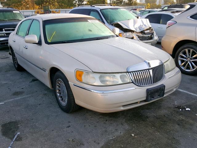 1LNHM83W5XY641898 - 1999 LINCOLN TOWN CAR C CREAM photo 1