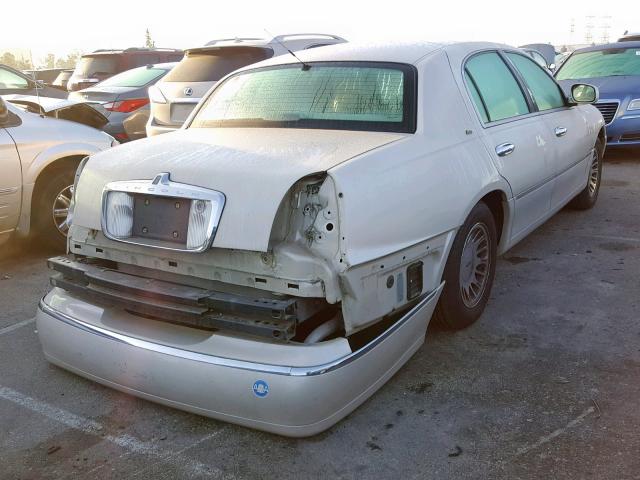 1LNHM83W5XY641898 - 1999 LINCOLN TOWN CAR C CREAM photo 4