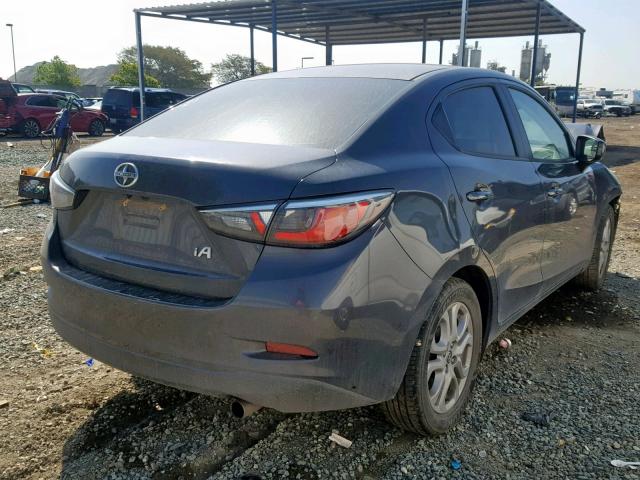 3MYDLBZV0GY141199 - 2016 TOYOTA SCION IA GRAY photo 4