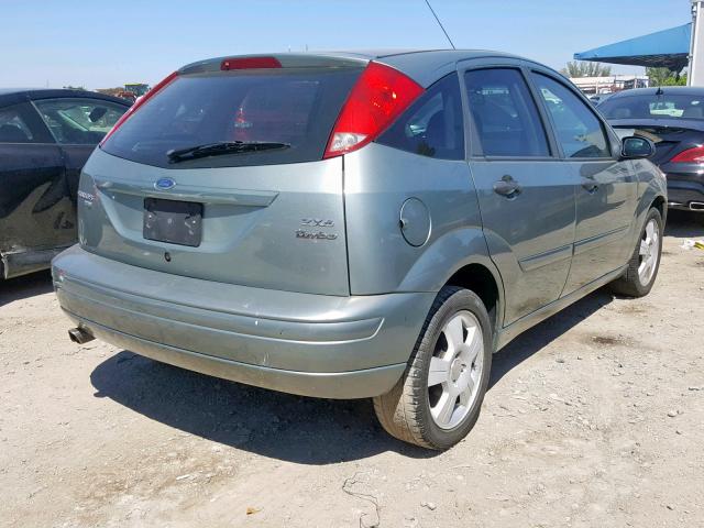 1FAHP37N36W239362 - 2006 FORD FOCUS ZX5 SILVER photo 4