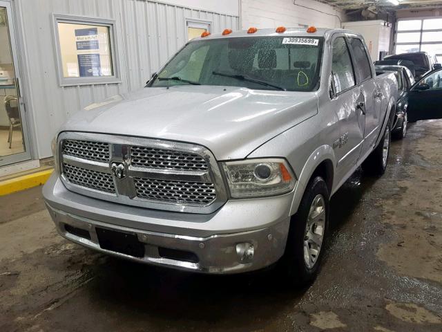 1C6RR7NTXFS696847 - 2015 RAM 1500 LARAM SILVER photo 2