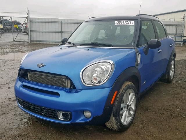 WMWZC5C57BWM10326 - 2011 MINI COOPER S C BLUE photo 2