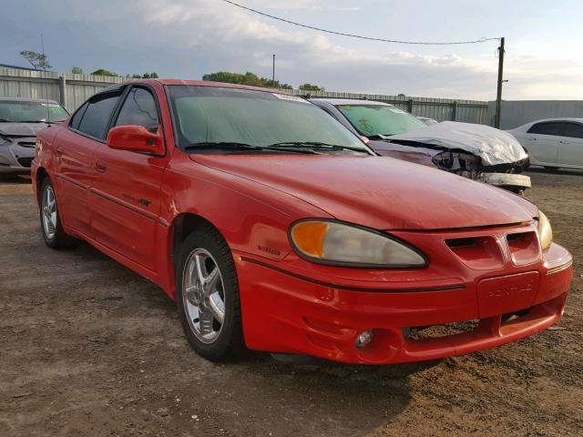 1G2NW52E2XM940673 - 1999 PONTIAC GRAND AM G RED photo 1