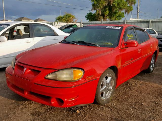 1G2NW52E2XM940673 - 1999 PONTIAC GRAND AM G RED photo 2