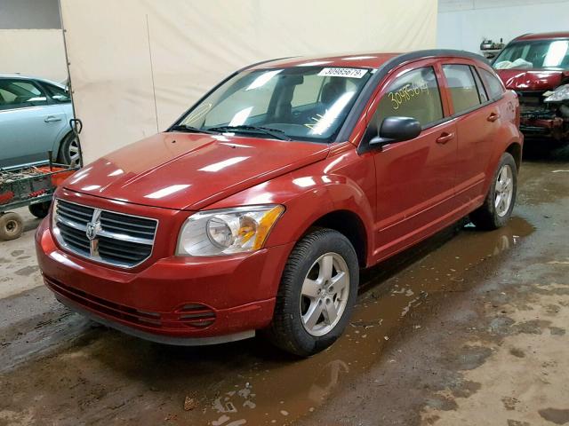 1B3HB48A69D233163 - 2009 DODGE CALIBER SX RED photo 2