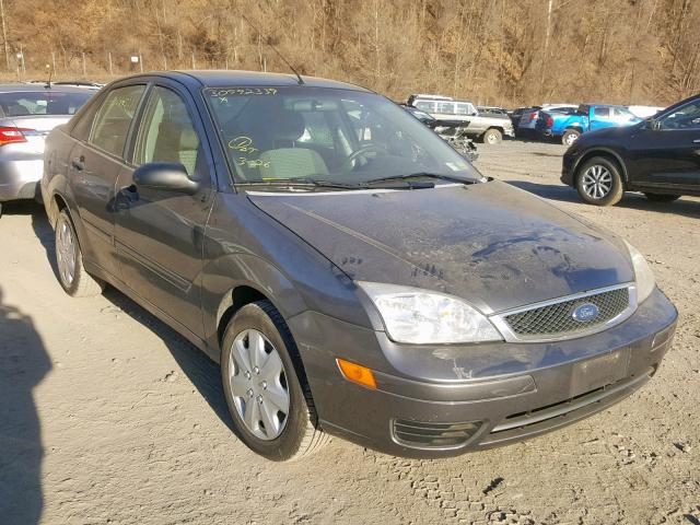 1FAFP34N07W319439 - 2007 FORD FOCUS ZX4 GRAY photo 1
