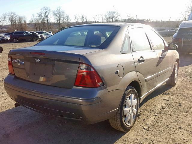1FAFP34N07W319439 - 2007 FORD FOCUS ZX4 GRAY photo 4