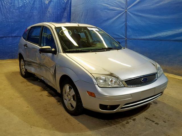 1FAHP37NX7W136893 - 2007 FORD FOCUS ZX5 SILVER photo 1