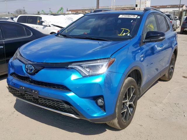 JTMJJREV9HD140014 - 2017 TOYOTA RAV4 HV SE BLUE photo 2