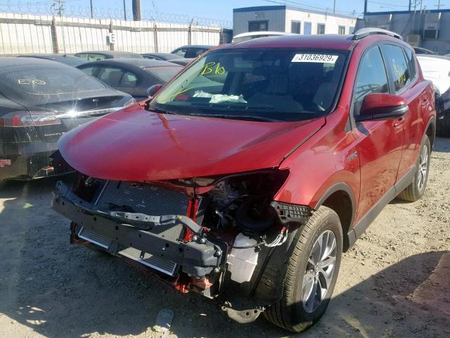 JTMRJREV2JD186812 - 2018 TOYOTA RAV4 HV LE RED photo 2