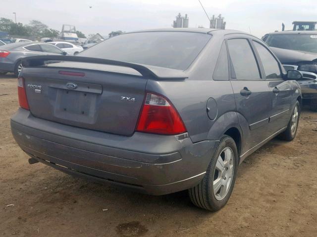 1FAFP34N36W132890 - 2006 FORD FOCUS ZX4 GRAY photo 4