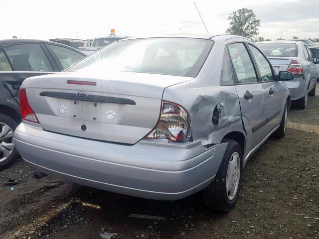 1FAHP33P42W336071 - 2002 FORD FOCUS LX SILVER photo 4