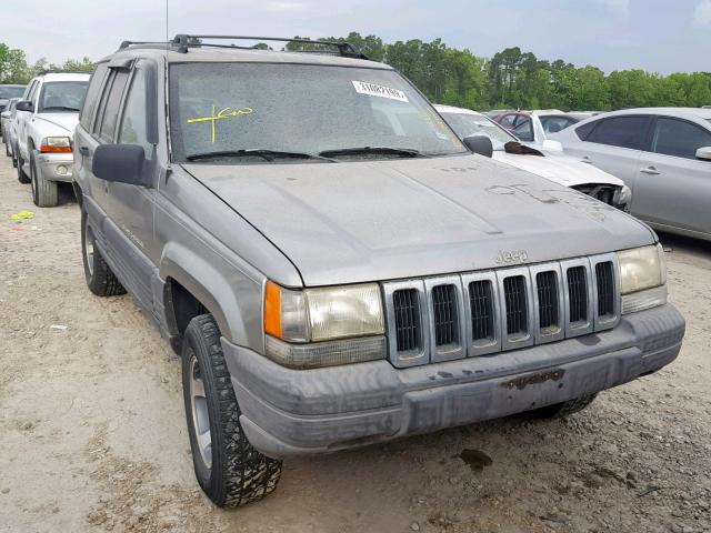 1J4FX58S9WC135634 - 1998 JEEP GRAND CHER TAN photo 1