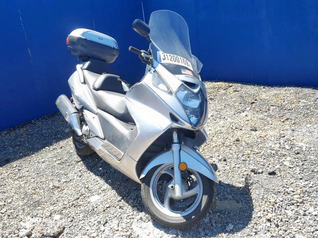 JH2PF01194K201630 - 2004 HONDA FSC600 D SILVER photo 1